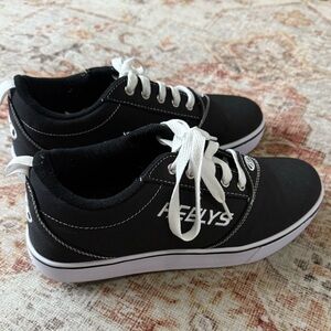 BRAND NEW black heely shoes